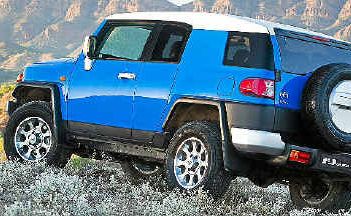 The Toyota FJ Cruiser’s shape and voodoo blue exterior creates a commotion wherever it goes. The Toyota FJ Cruiser’s shape and voodoo blue exterior creates a commotion wherever it goes.